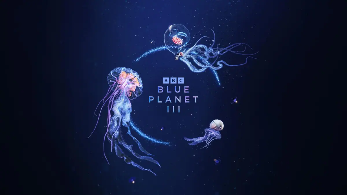 BBC Blue Planet III key art with glowing jellyfish and an octopus on a deep navy background