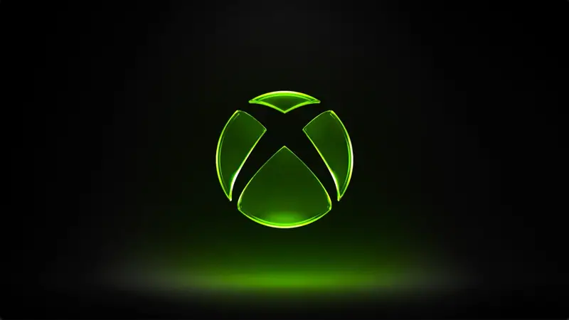 Glowing green Xbox logo on a black background